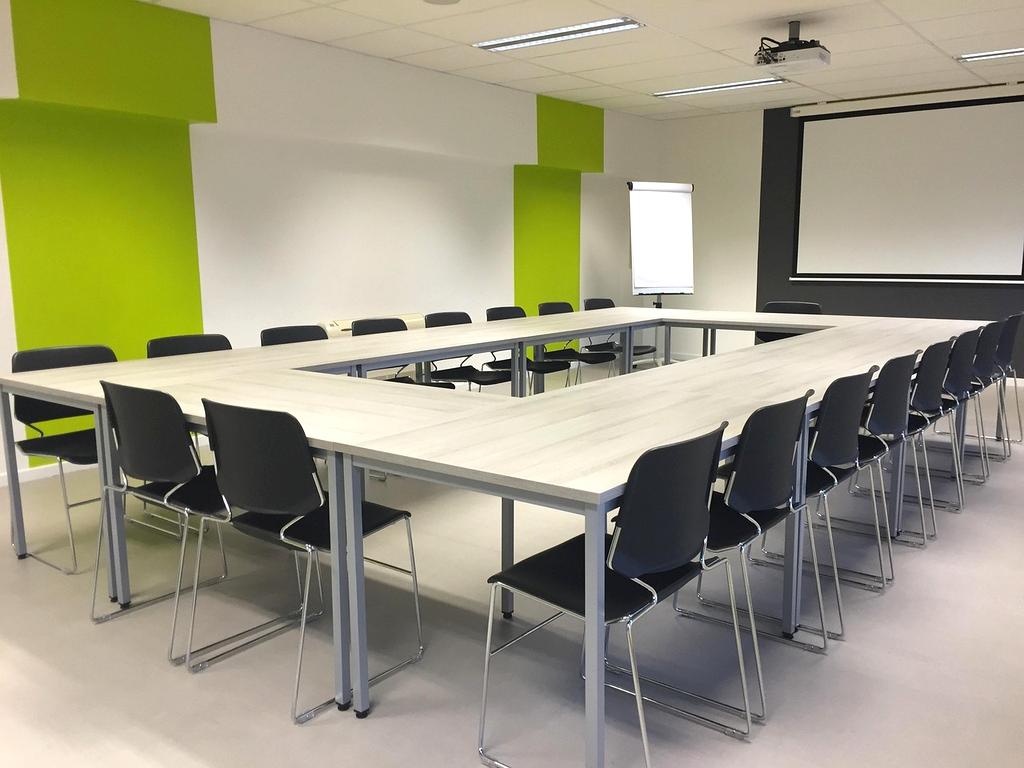 Team in a modern conference room discussing strategy